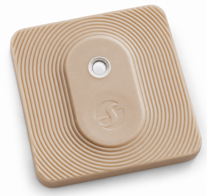 Beige square smart device with textured concentric ripple design, white circular button and embossed logo